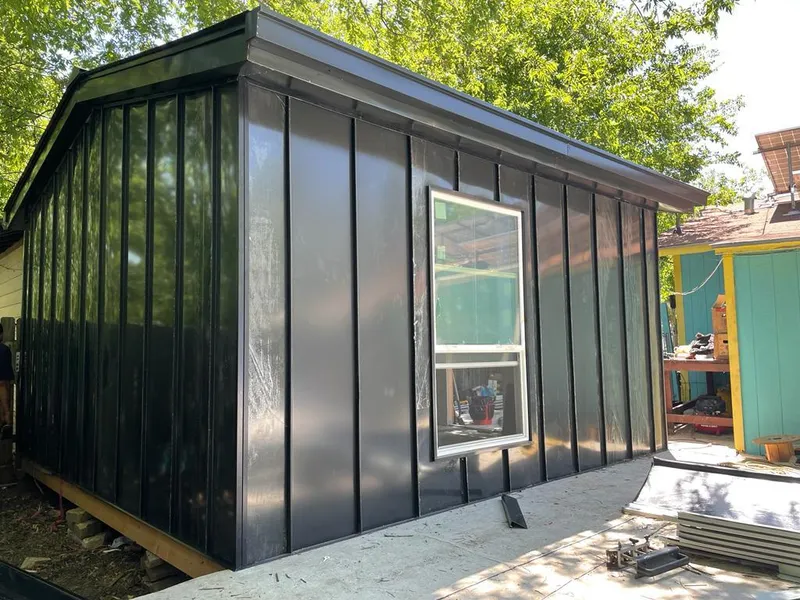 Black standing seam metal wall panels for Metal Roof Installation in Midlothian